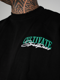 CULTIVATE - AUTHENTIC  “BLACK ON CELTIC GREEN”