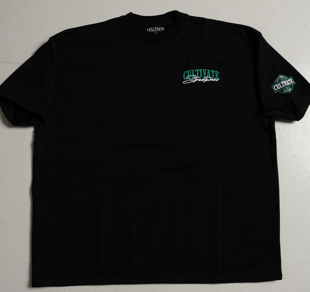 CULTIVATE - AUTHENTIC  “BLACK ON CELTIC GREEN”