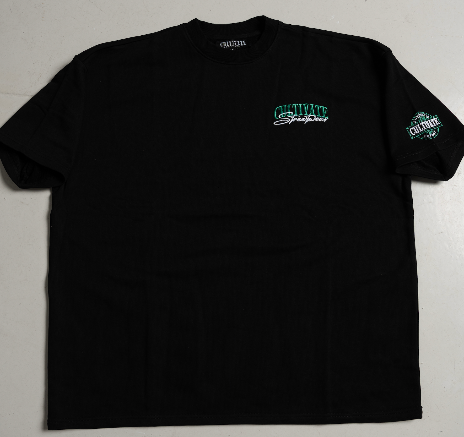 CULTIVATE - AUTHENTIC  “BLACK ON CELTIC GREEN”