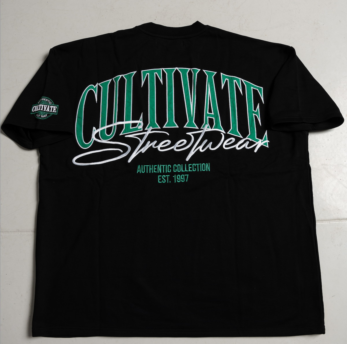 CULTIVATE - AUTHENTIC  “BLACK ON CELTIC GREEN”