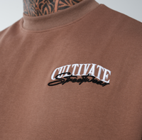 CULTIVATE - AUTHENTIC “DEVINE CHOCOLATE ON OFF WHITE”